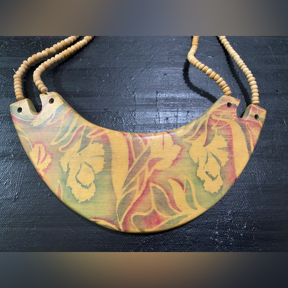 Wooden statement necklace with stencil art
